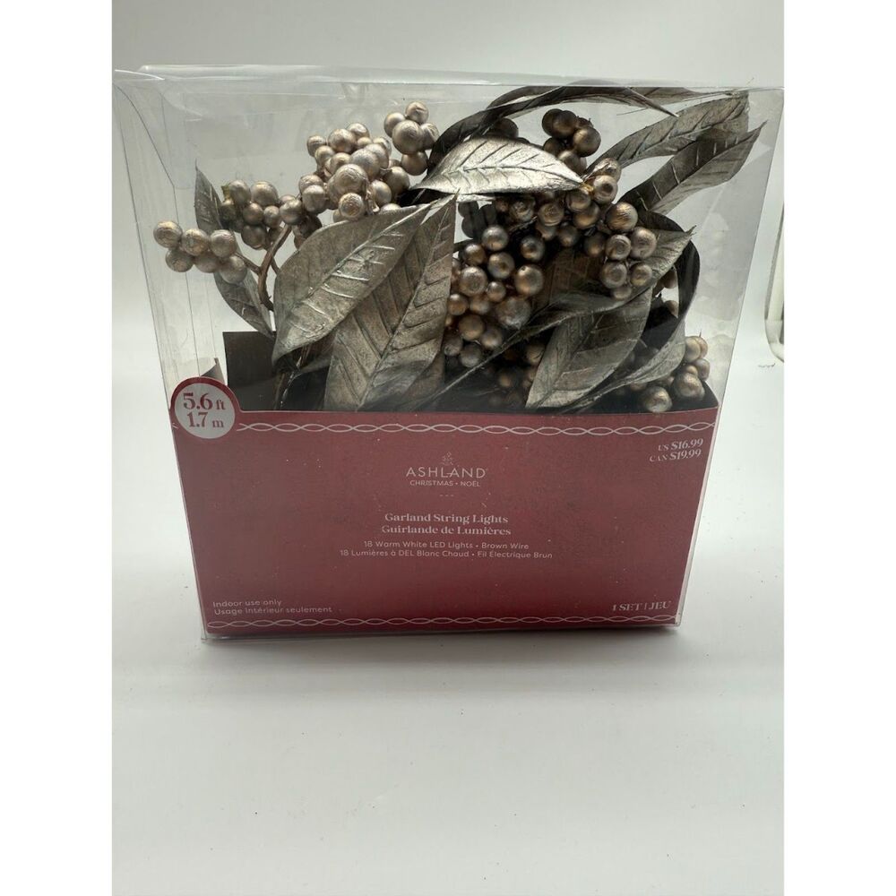 Ashland Christmas Garland LED String Lights with silver berries and leaves.